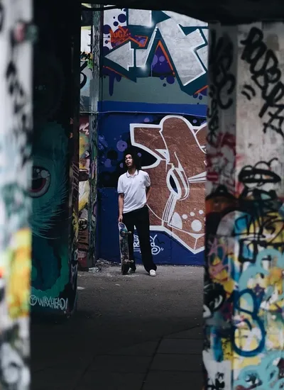 Patricia Rose by her mural in Balmy Alley. Photo by Deston Nokes.